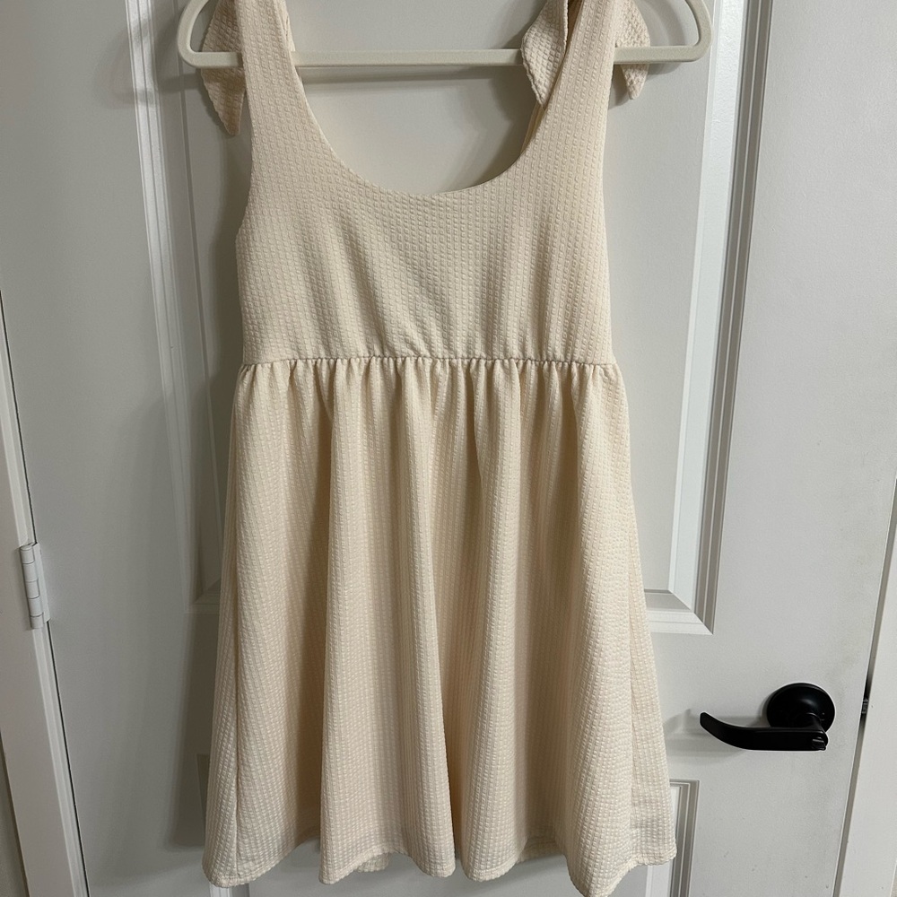 Cream Textured Sleeveless Dress